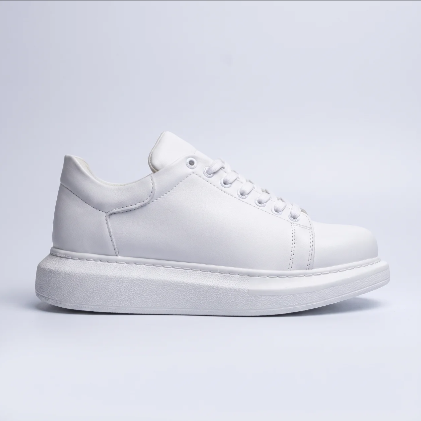 White FANTASIA plain sneakers by Shopify, featuring a sleek design and comfortable fit, shown on a clean background.