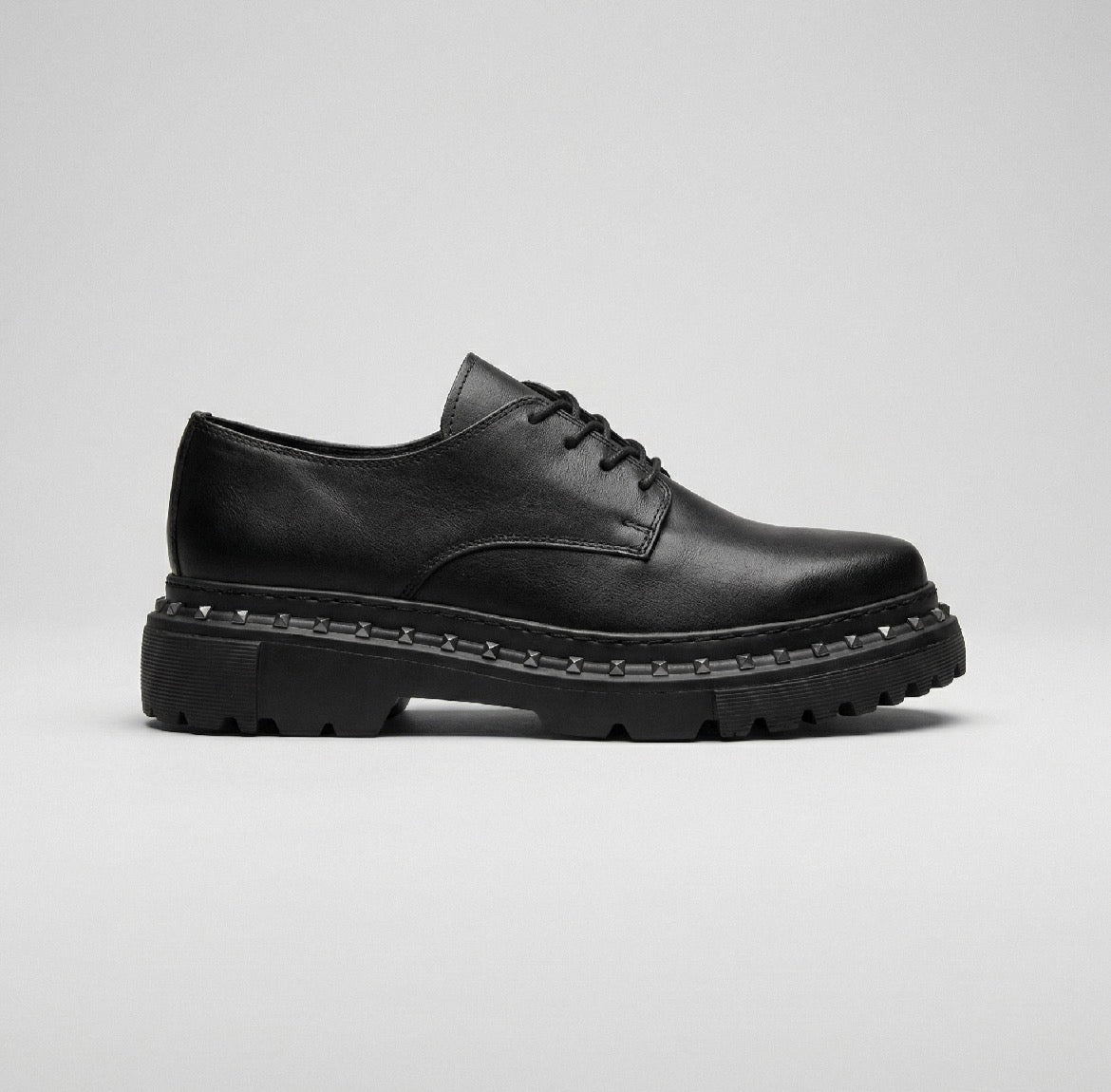 Chekich South Africa ASI Black sneakers with sleek design and black color, showing front view of stylish athletic footwear.
