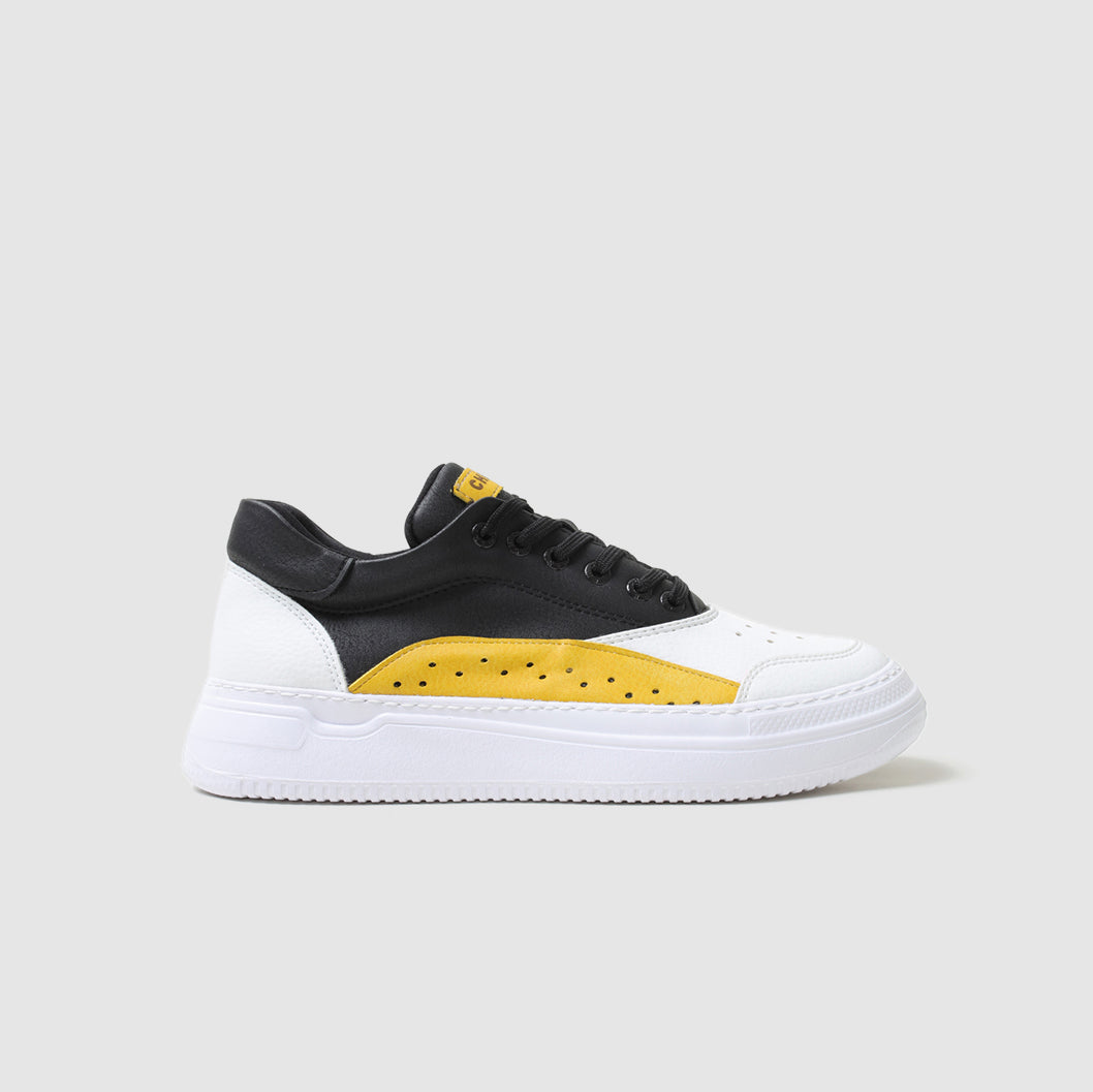 Black and yellow Shopify Apollo sneakers with stylish design and comfortable fit, featuring laces and branding details.