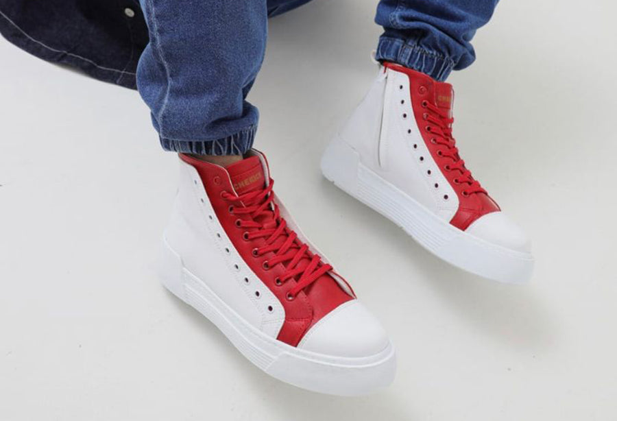 White and red Shopify BLAZER sneakers with stylish design, displayed on a clean background.