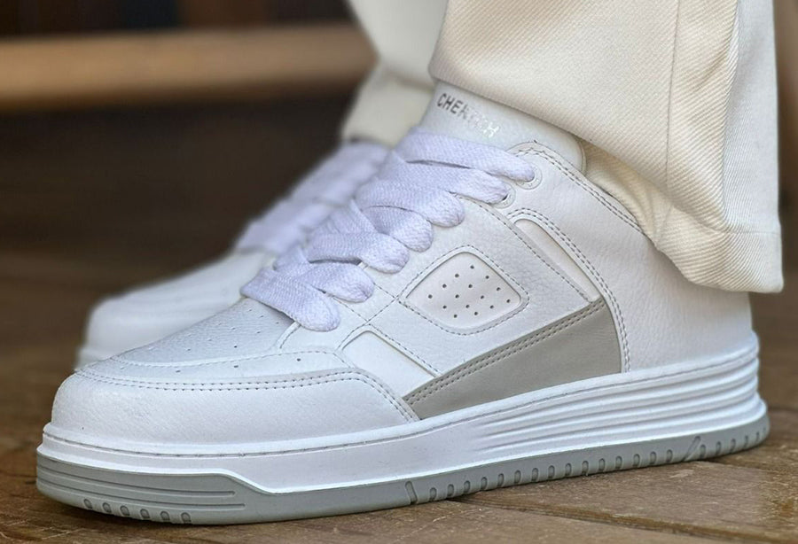Shopify BLUR White sneakers featuring a sleek white design and comfortable fit, suitable for casual and athletic wear.