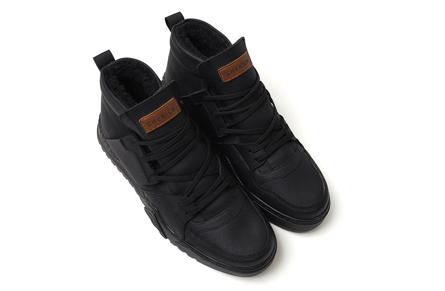 Black Ghost Line sneakers by Shopify featuring a sleek all-black design and modern athletic style.