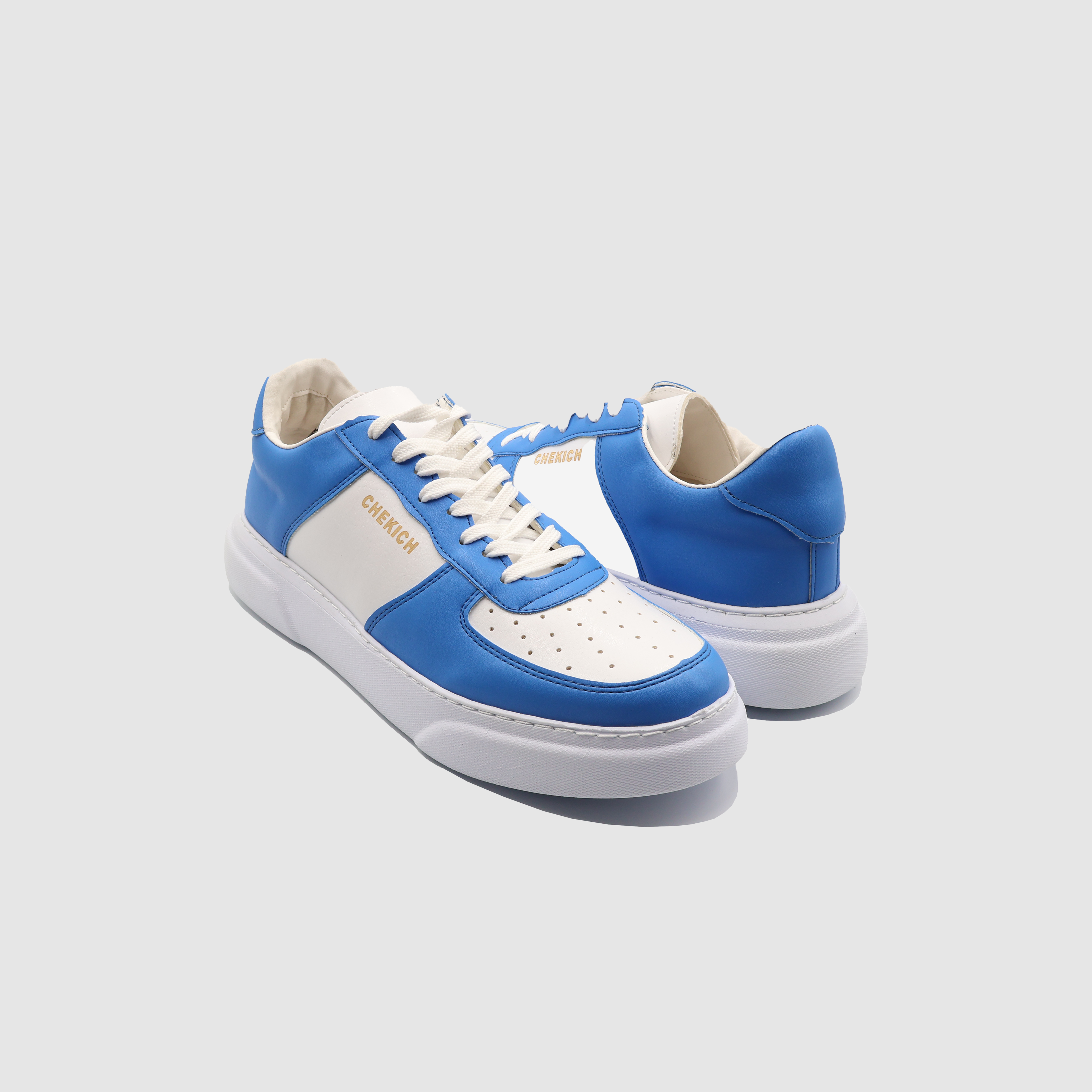Blue Flatline sneakers by Shopify, showcasing sleek design and comfortable fit, with stylish laces and modern athletic look.