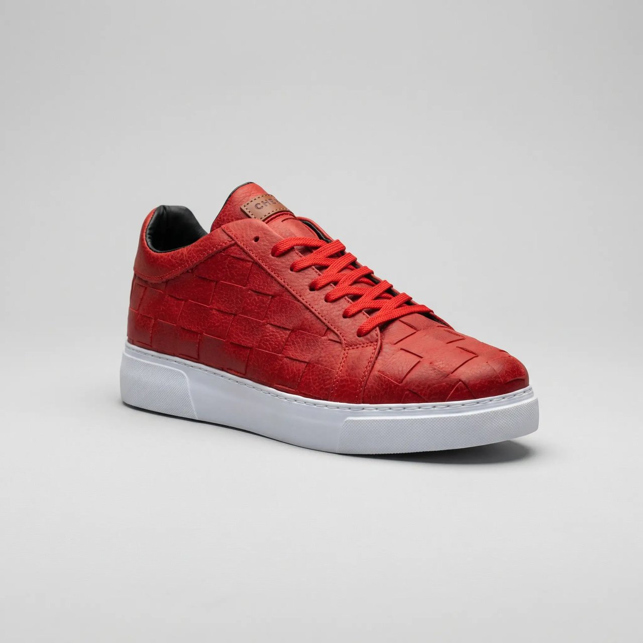 Red VIMINI sneakers by Shopify with stylish design and comfortable fit, shown in the product image.