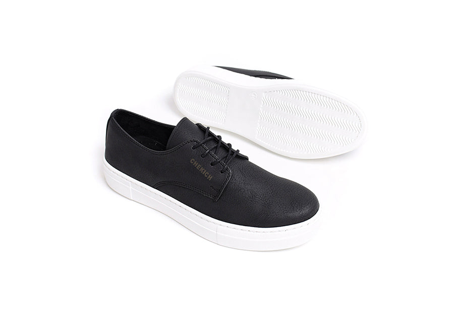 Black Pitti sneakers by Shopify featuring sleek design and comfortable fit, shown from a side angle.