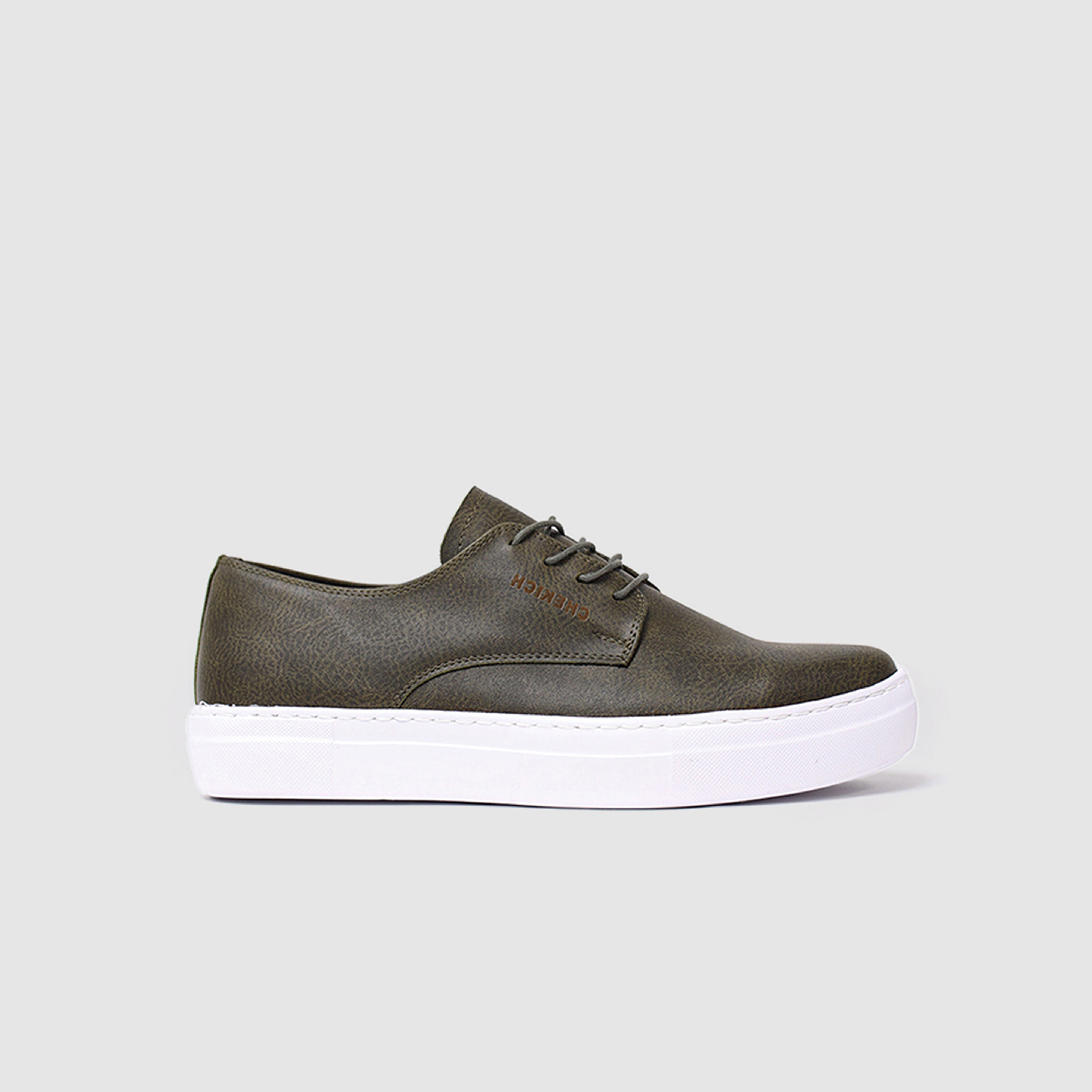 Green Pitti Sneakers by Shopify featuring stylish design and comfortable fit, ideal for casual wear.