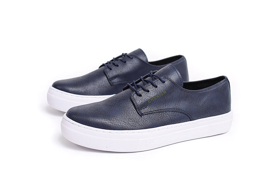 Navy Pitti sneakers by Shopify with white soles and laces, stylish casual footwear for everyday wear.