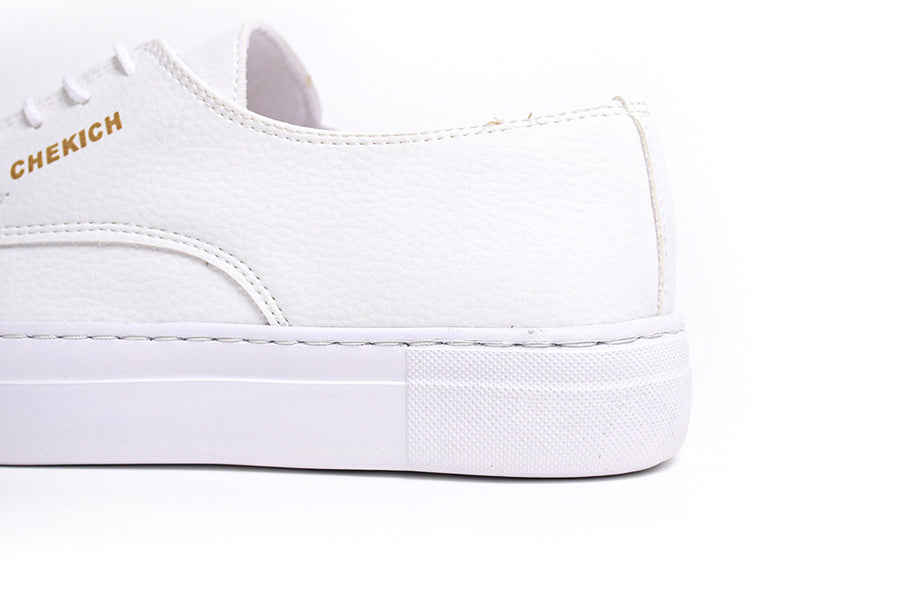 White Pitti sneakers by Shopify, featuring a sleek design and casual style, shown from a side view on a plain background.