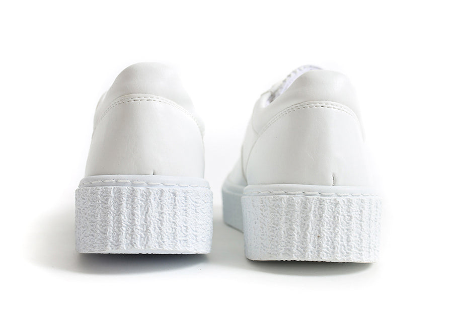 White Pyramid sneakers by Shopify featuring a sleek design and modern style, shown from a side angle.
