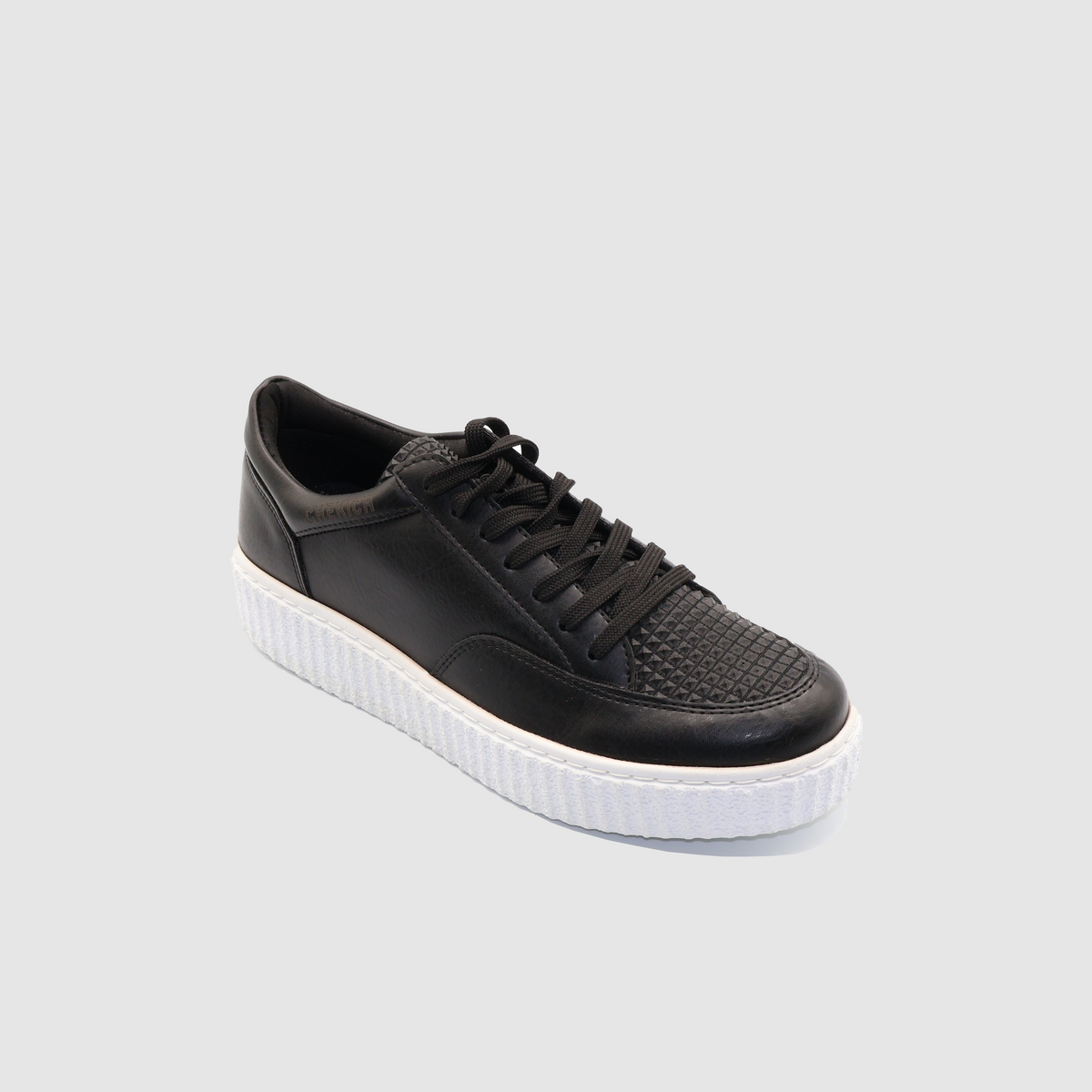 Black Pyramid sneakers from Shopify featuring a sleek design with white accents, showcasing the stylish footwear in a side view.