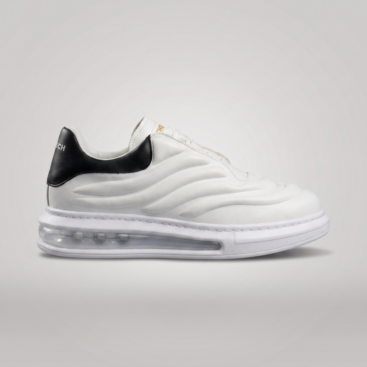 Chekich South Africa ASTRO white and black sneakers with stylish design and comfortable fit, shown in the product image.