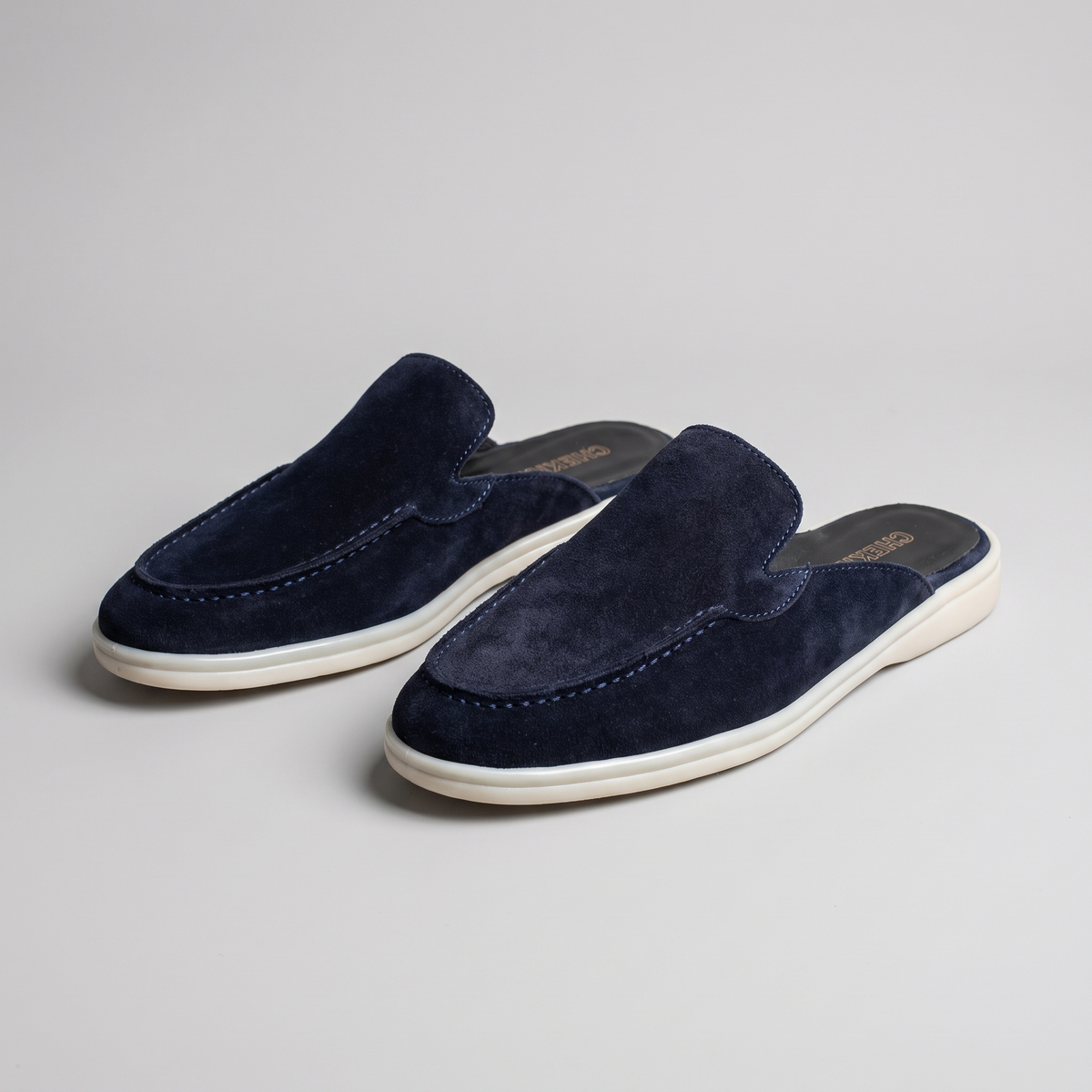 Chekich South Africa Clifton Mule in navy with pointed toe and slip-on design, stylish and comfortable women's footwear.