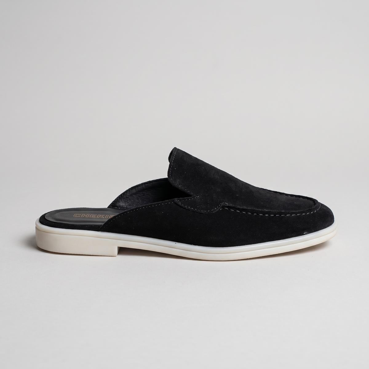 Black Clifton Mule shoe by Chekich South Africa, stylish slip-on footwear with a sleek design and comfortable fit.