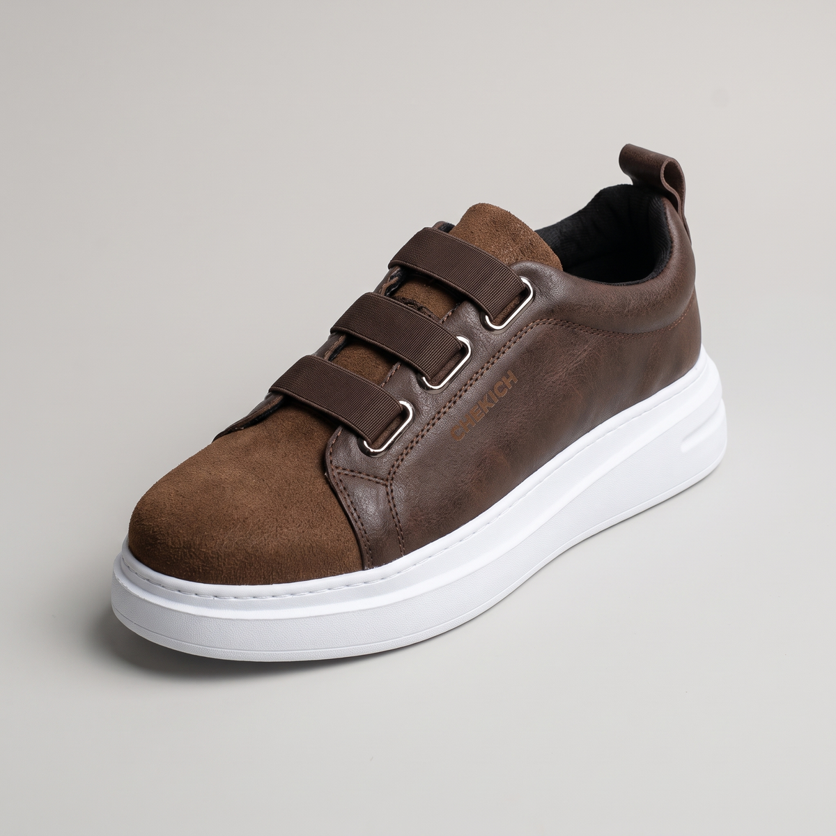 Chekich South Africa NONE V2 Brown sneaker showing brown leather upper and stylish design details.