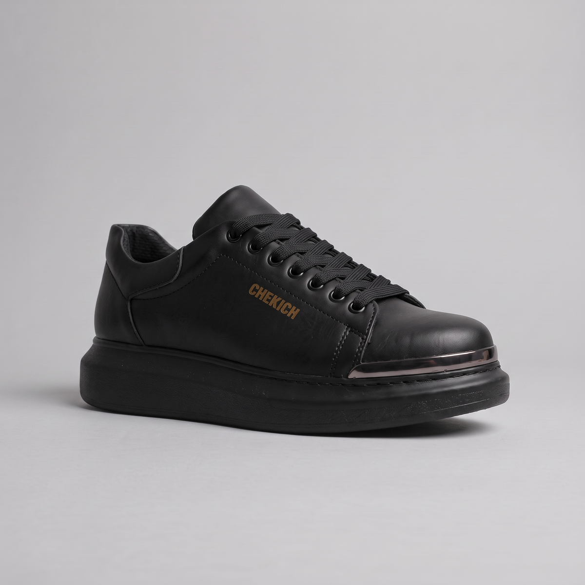 Chekich FANTASIA ST sneakers pair, three-quarter view showing the rose-gold toe cap and gold CHEKICH branding