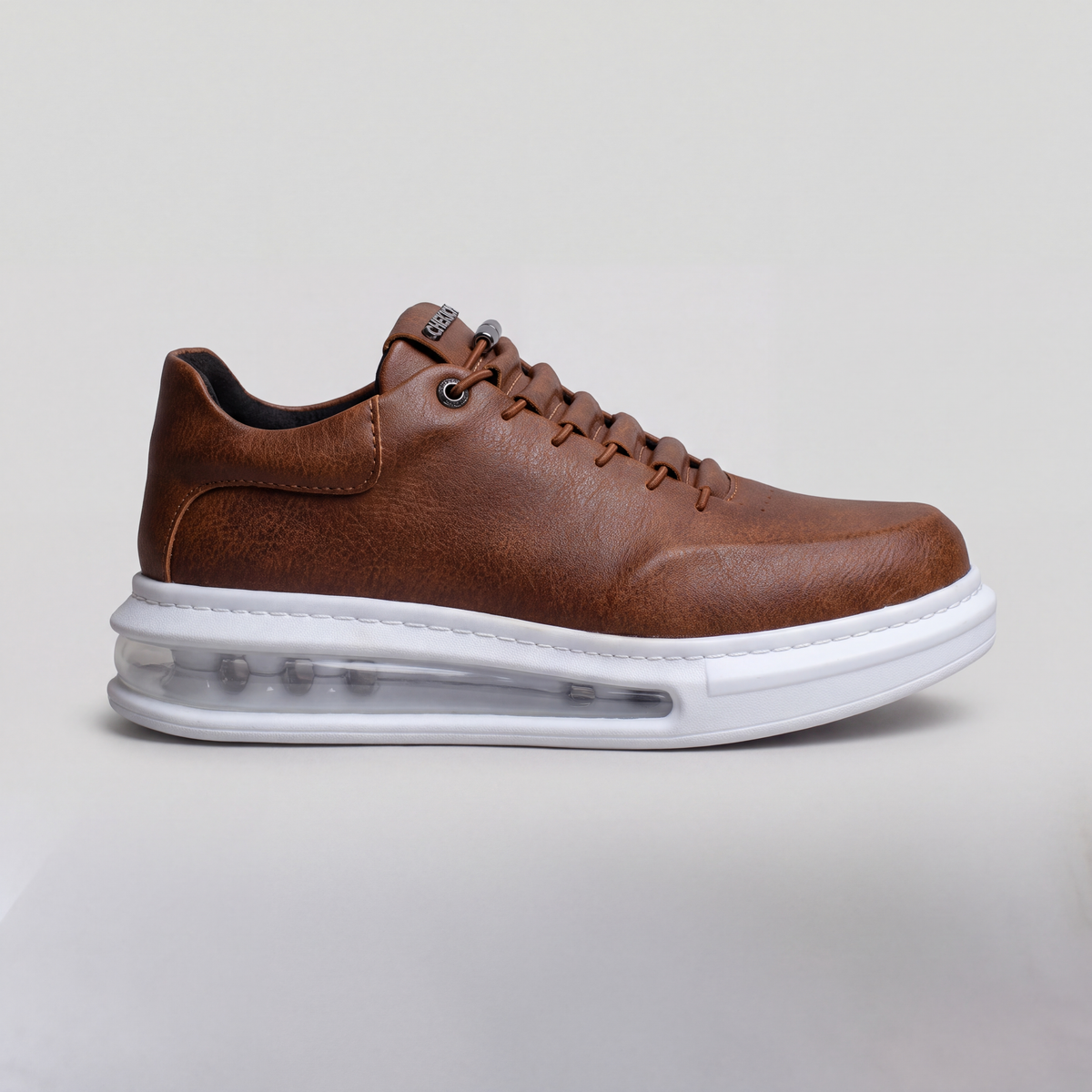 Chekich South Africa AVAX brown and white sneakers with stylish design and comfortable fit, shown from a side view.