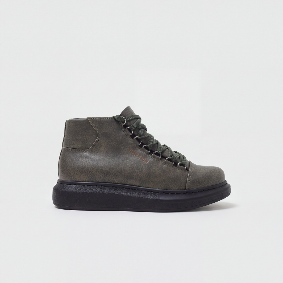 Chekich South Africa ROMA green and black boots with stylish design and ankle-high length, showcasing their trendy footwear style.