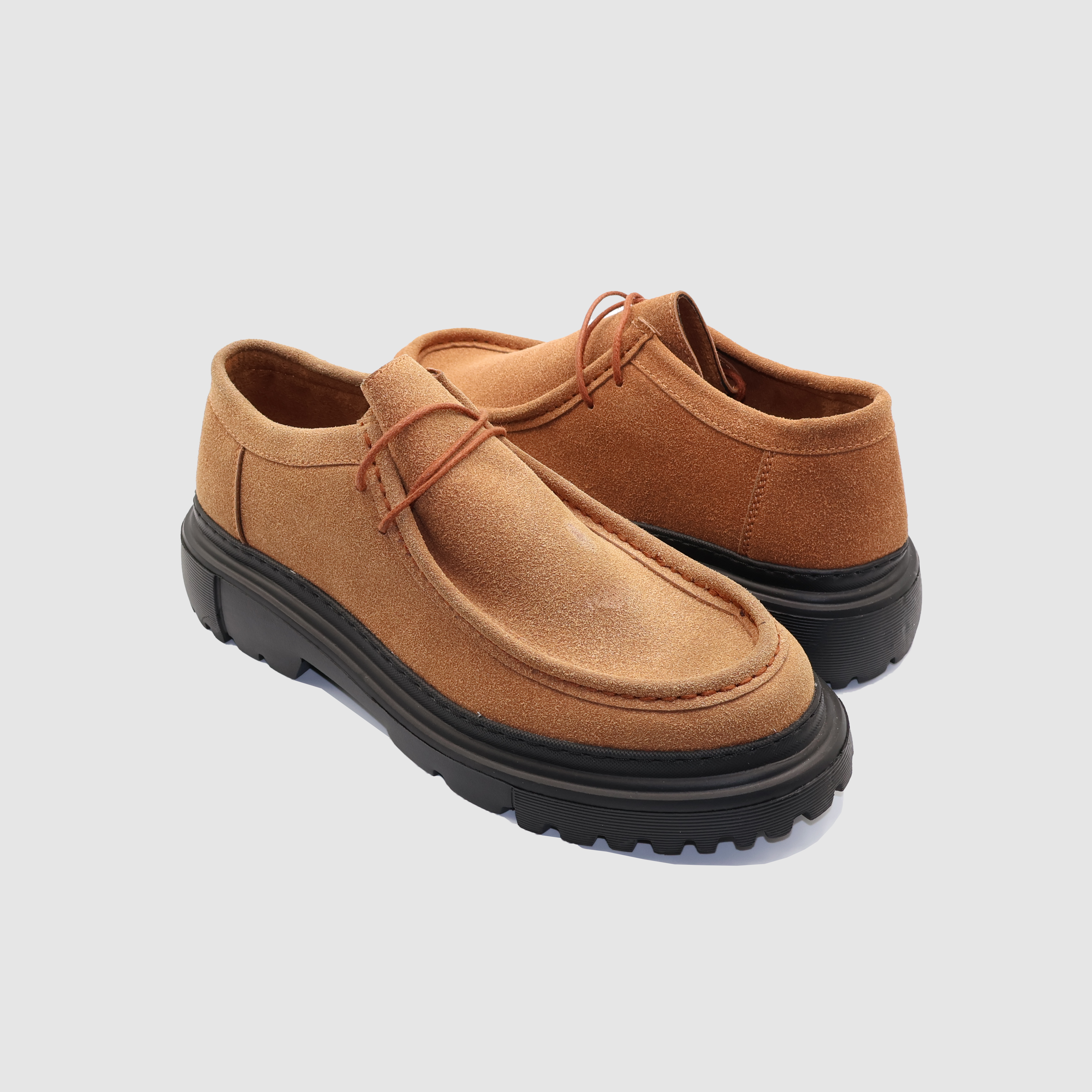 Shopify Berlin Brown and Black loafers featuring a classic design with brown and black leather accents.