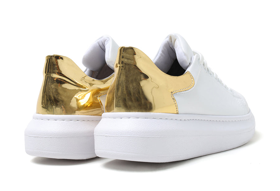 White Fantasia Touch Gold sneakers by Shopify featuring gold accents and stylish design.