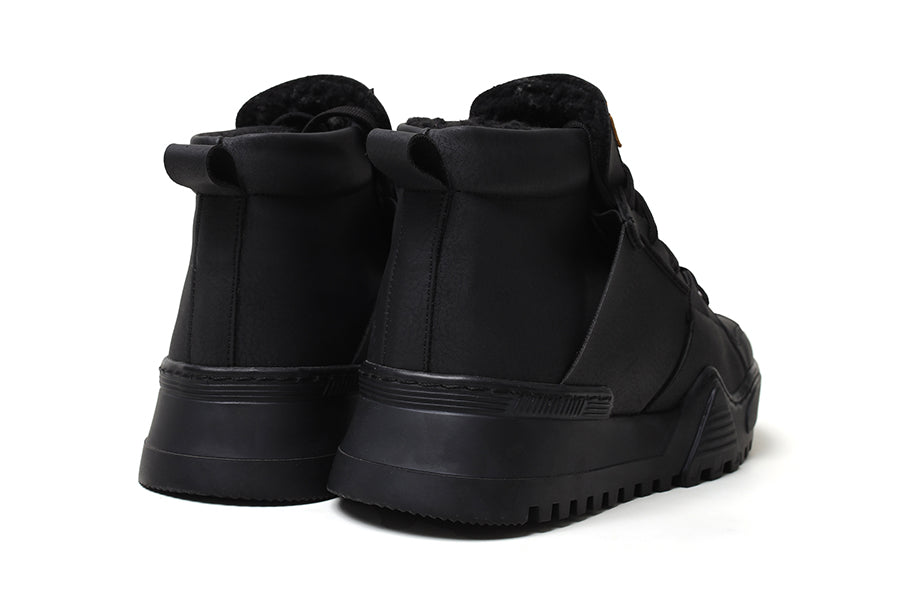 Black Ghost Line sneakers by Shopify featuring sleek all-black design and modern athletic style.