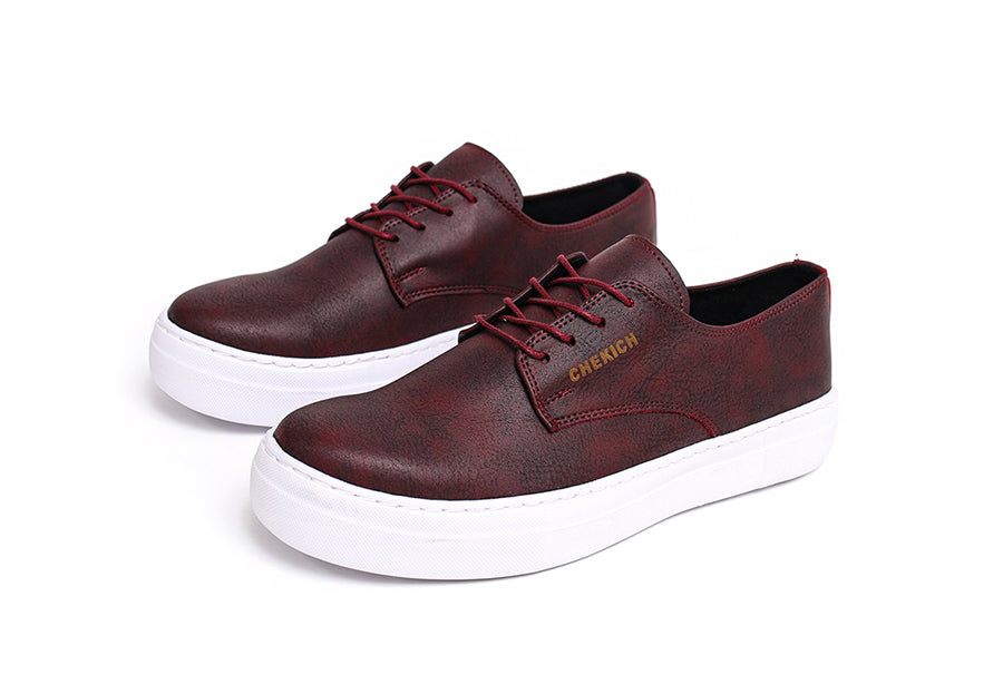 Shopify Pitti Burgundy sneakers in a rich burgundy color with white sole, showcasing stylish casual footwear.