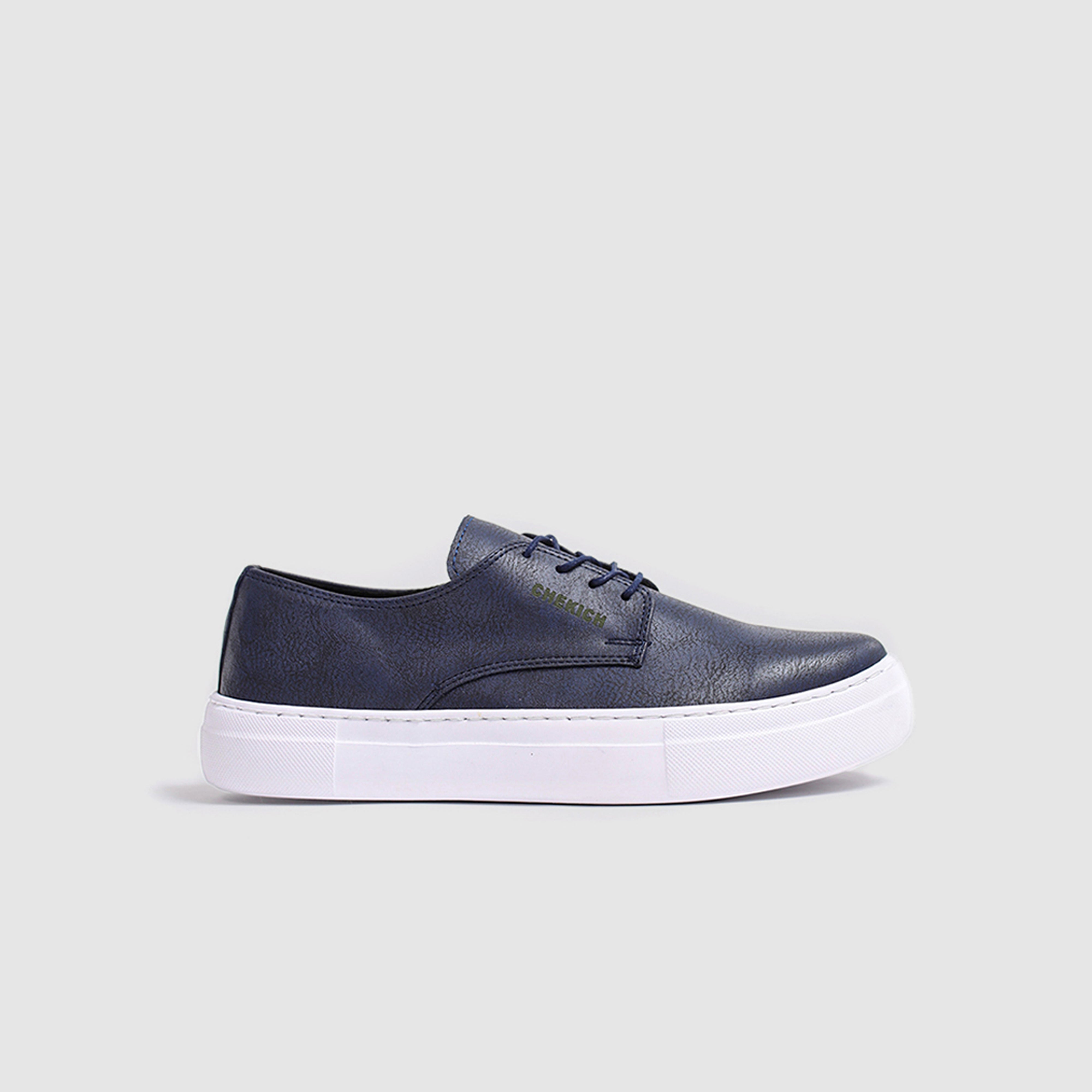 Navy Pitti sneakers by Shopify with white soles and laces, casual athletic shoes on a white background.