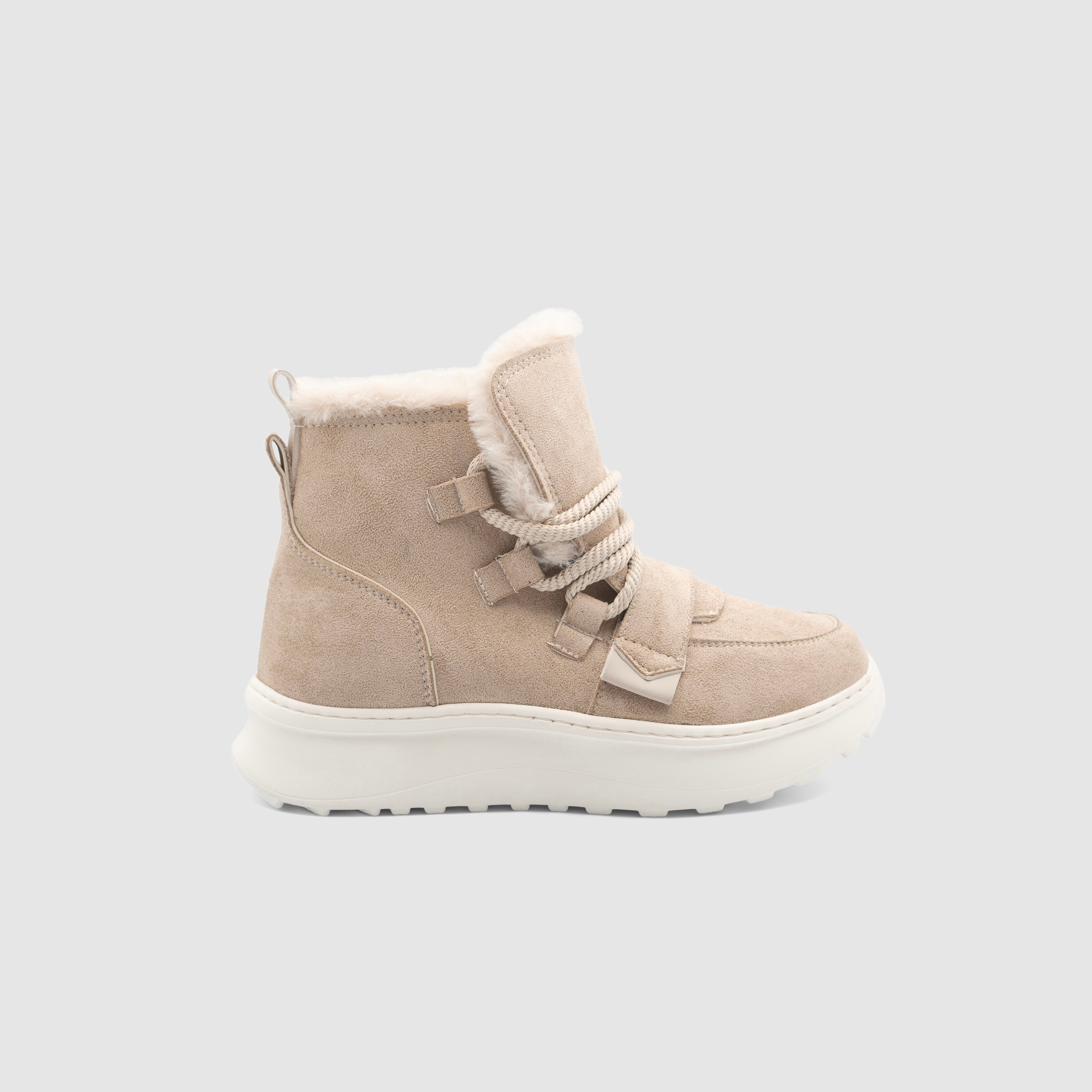Beige Santos sneakers by Shopify, featuring a comfortable design with stylish beige uppers and casual sneaker style.