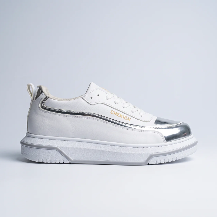 White and silver Signature Line Up Sneakers from Shopify, showcasing stylish casual footwear with clean design and modern accents.