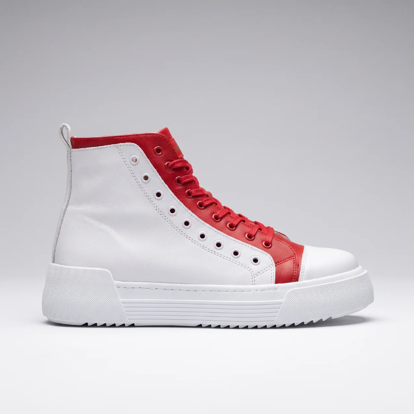 White and red Shopify sneakers featuring a sleek design, perfect for casual and athletic wear.