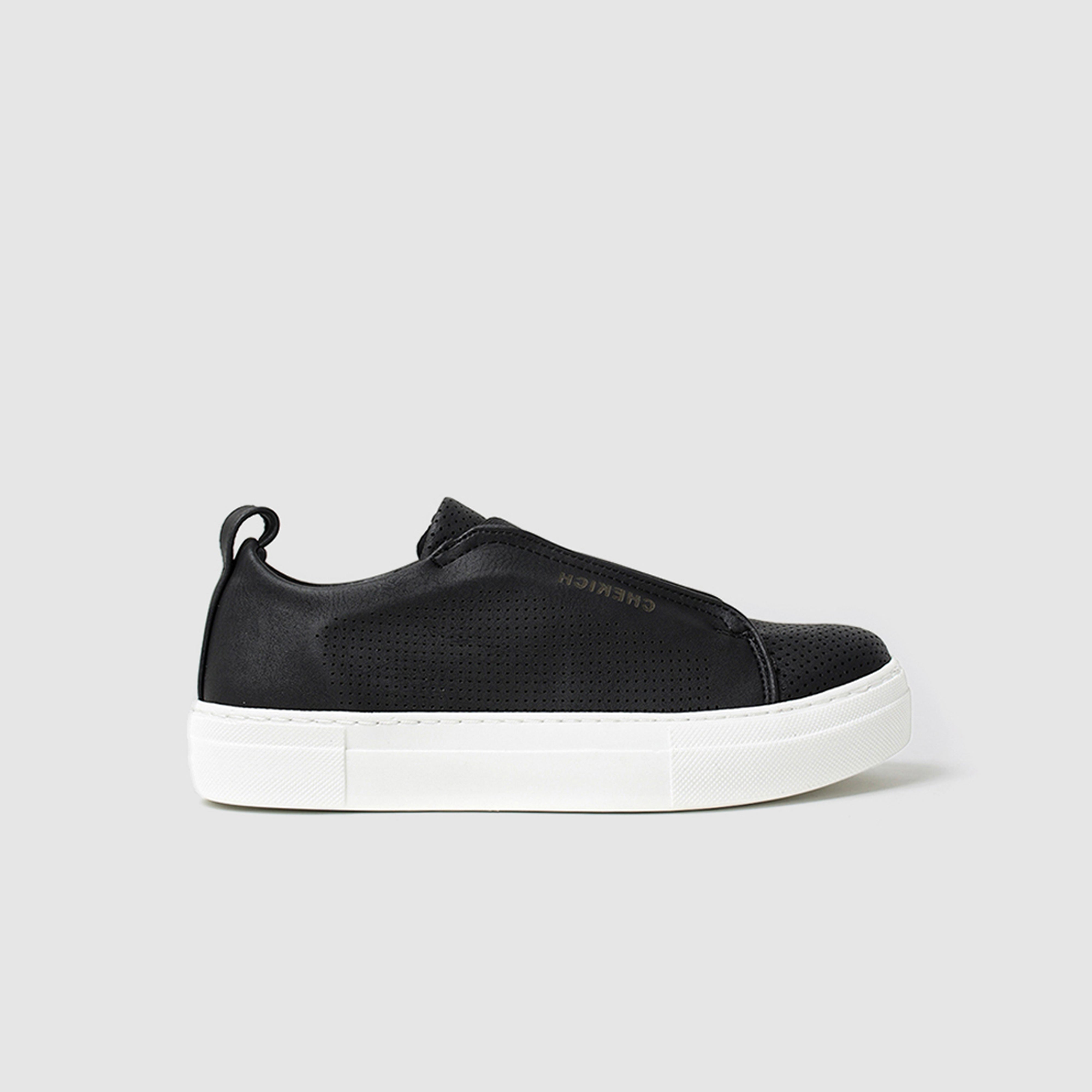 Black Shopify ZEN sneakers with sleek design and white sole, displayed on a plain background.