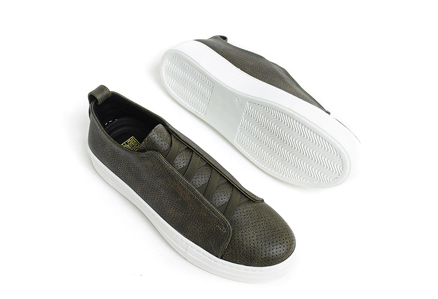 Navy ZEN Sneakers by Shopify with white soles and sleek design, shown from a side angle on a white background.
