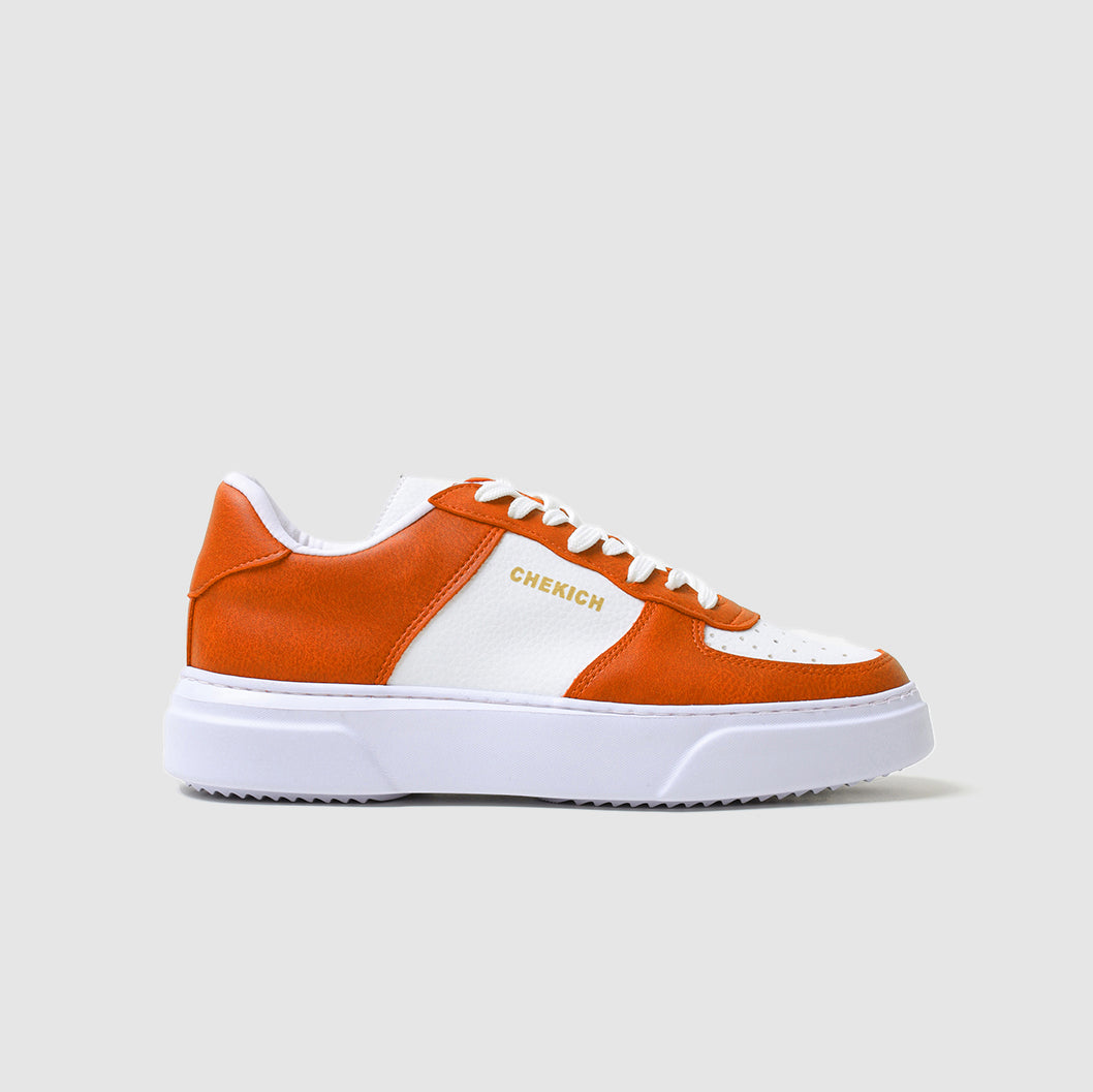 Orange Flatline sneakers by Shopify with stylish design and comfortable fit, shown in the image.