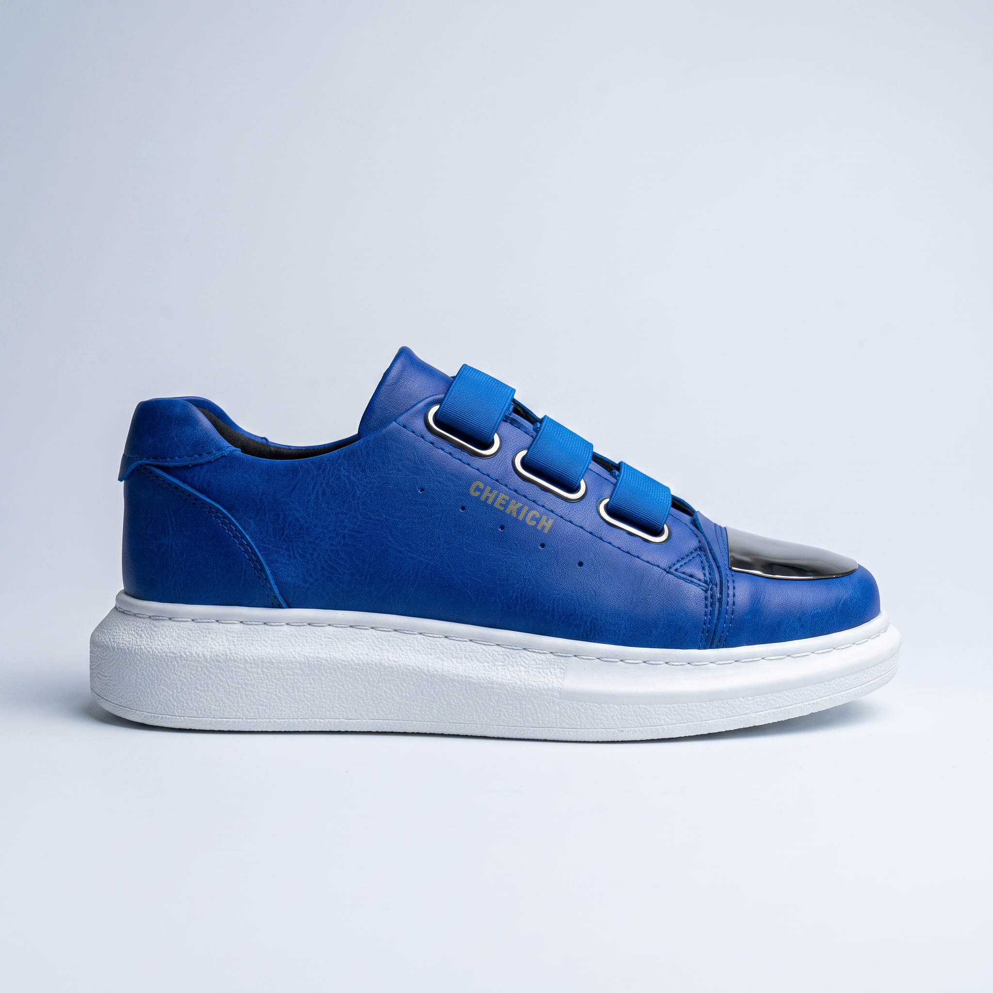 Blue Shopify MIRROR sneakers with white soles and laces, showcasing a sleek, modern design on a clean background.