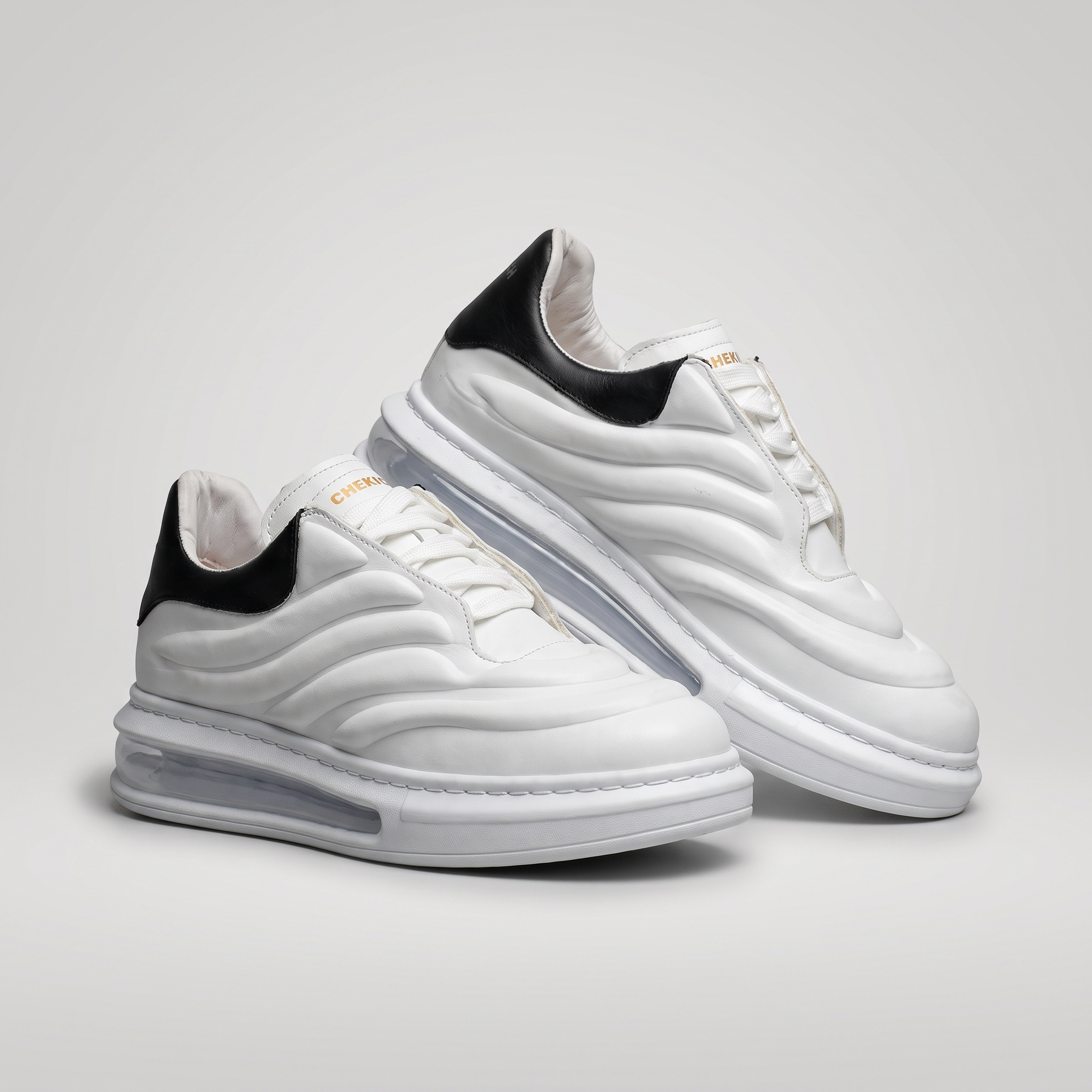 Chekich South Africa ASTRO white and black sneakers with stylish design and comfortable fit.
