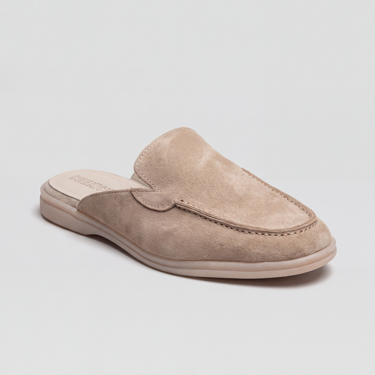 Chekich South Africa Clifton Mule Cream shoe with rounded toe and slip-on design, cream color, and textured sole.
