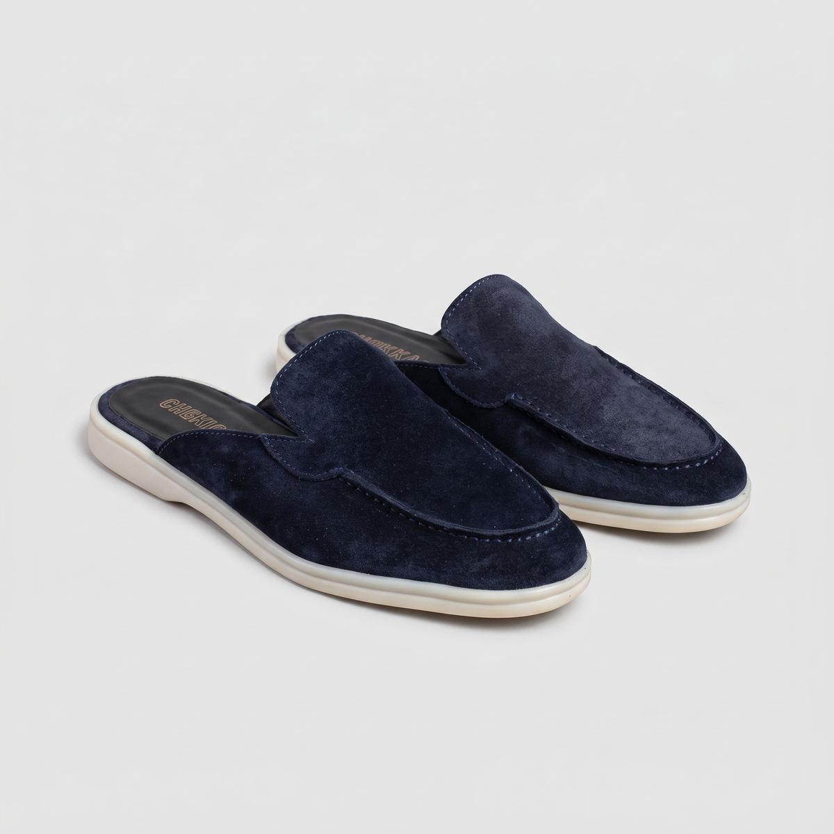Chekich South Africa Clifton Mule in navy with a sleek design and pointed toe, perfect for stylish casual wear.