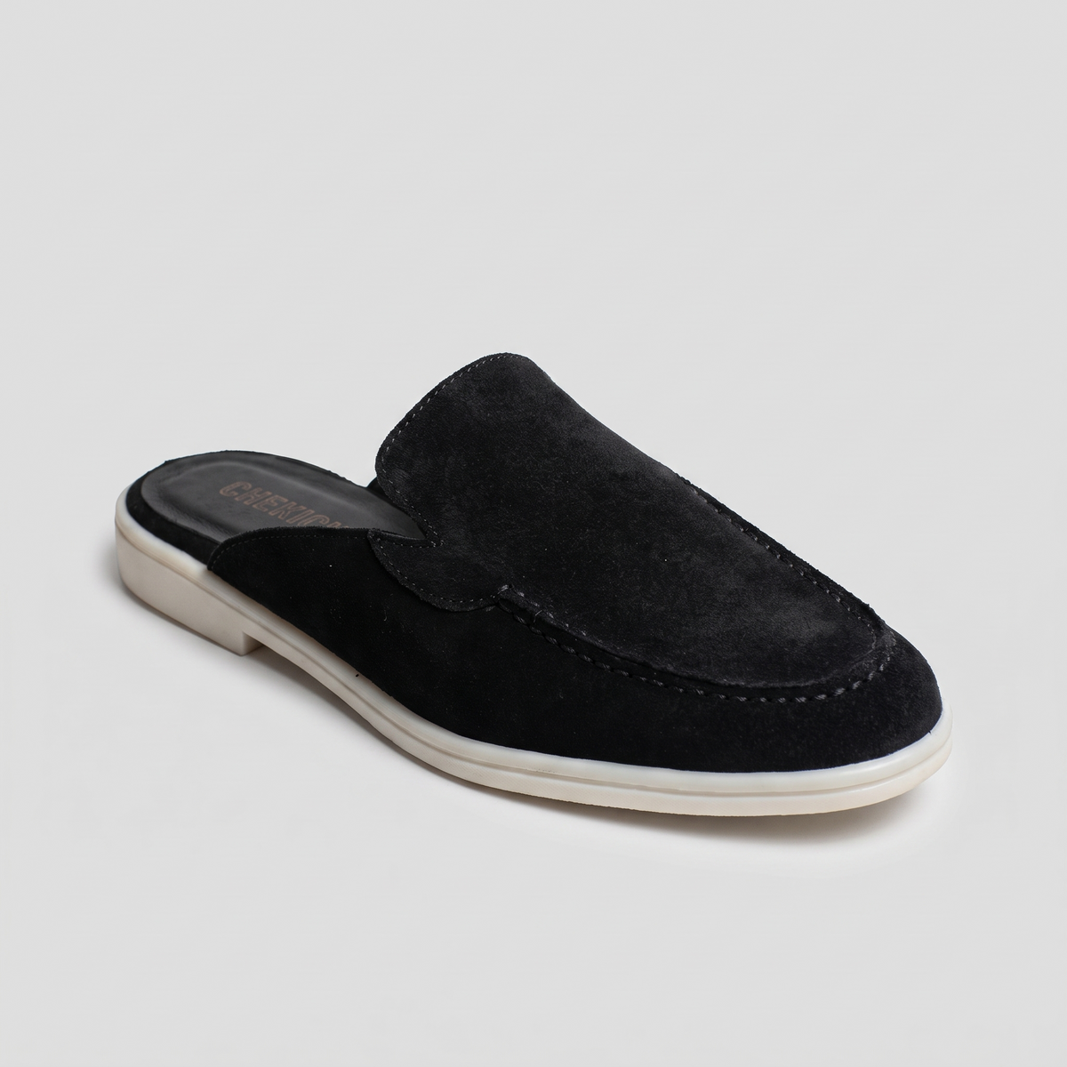 Black Clifton Mule by Chekich South Africa, stylish slip-on footwear with a sleek design and comfortable fit.