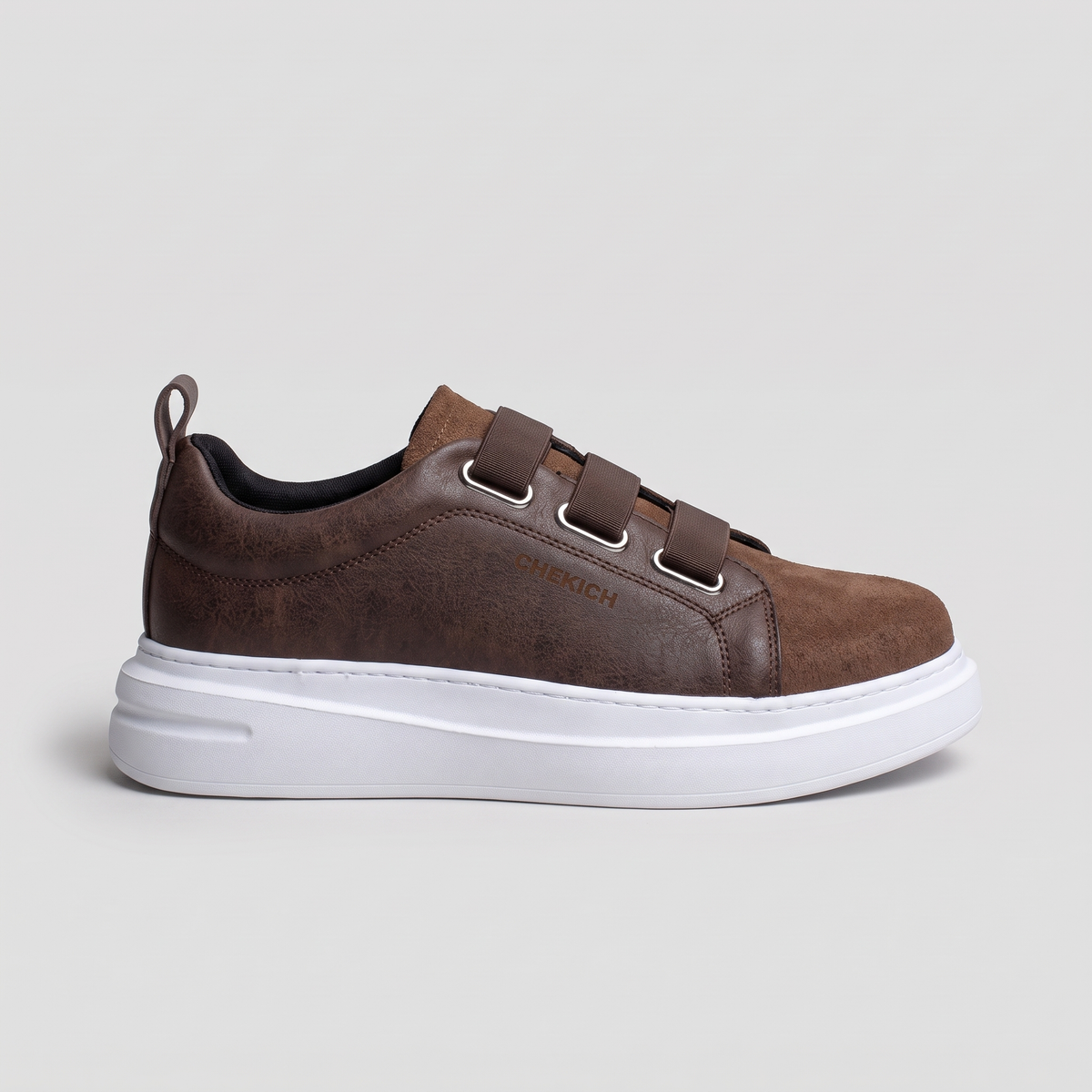 Chekich NONE V2 Brown sneakers, side view of the triple-strap leather upper with suede toe on a white platform sole