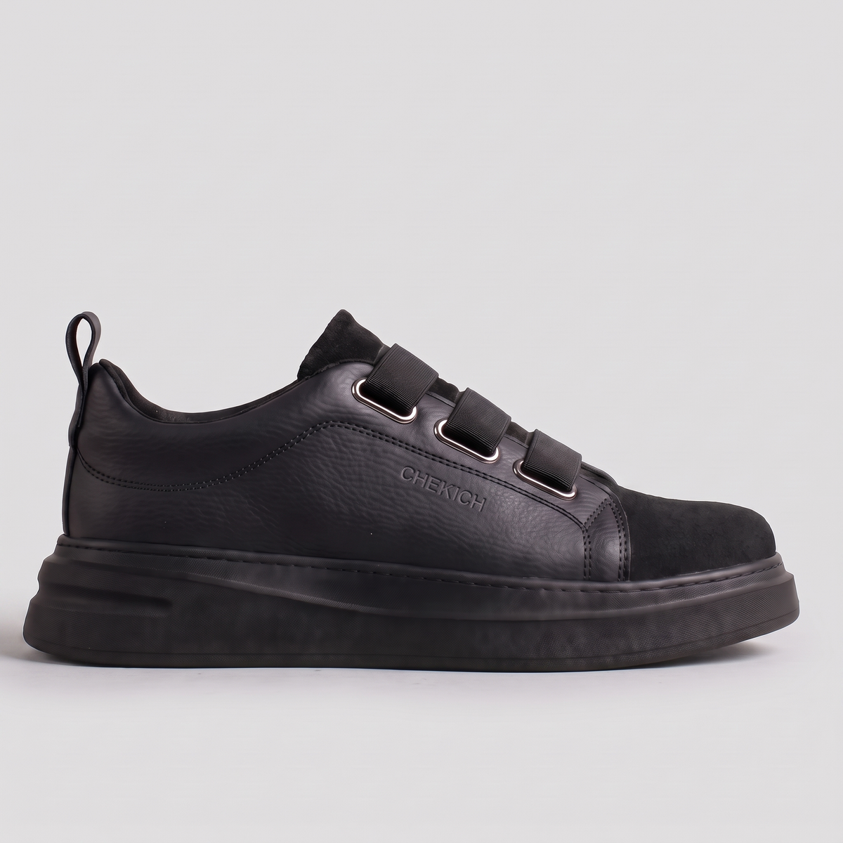 Chekich NONE V2 All Black sneakers, side view of the triple-strap black upper with suede toe on a black platform sole