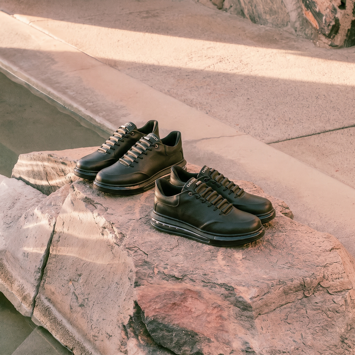 Black AVAX Sneakers by Shopify featuring a sleek all-black design with modern styling and comfortable fit.
