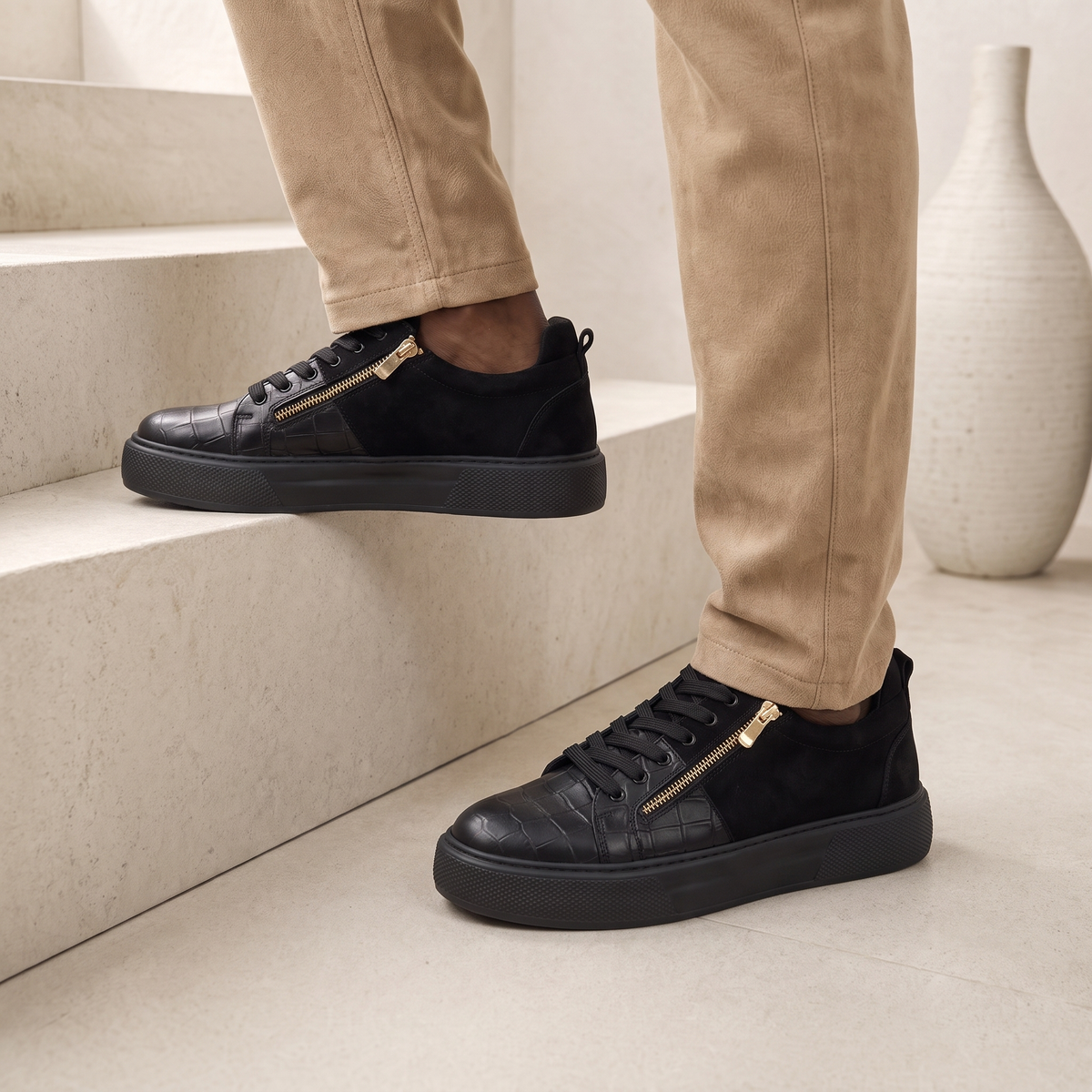 Black PHANTOM Sneakers by Shopify featuring sleek all-black design and modern athletic style.