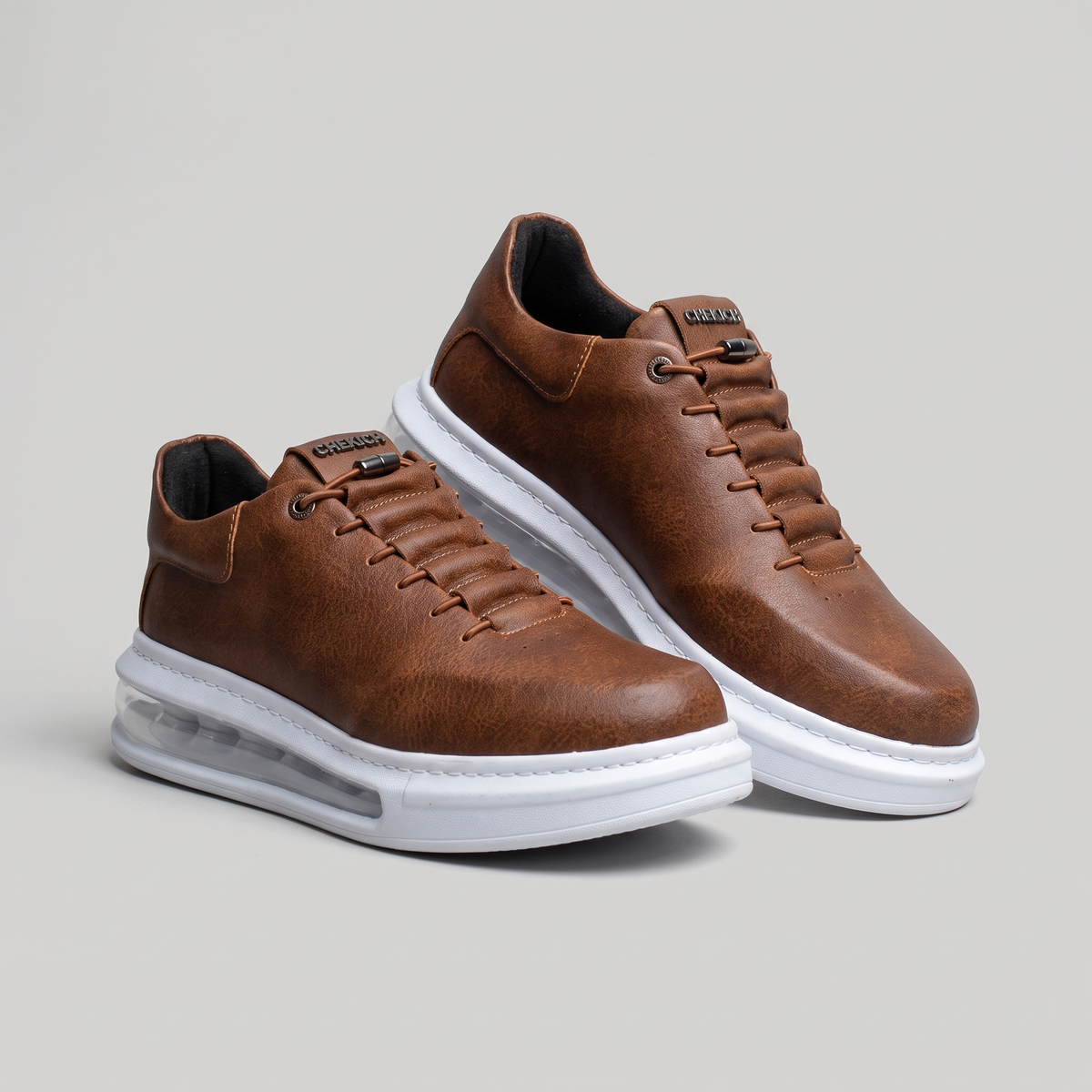 Chekich South Africa AVAX brown and white sneakers with stylish design and comfortable fit.