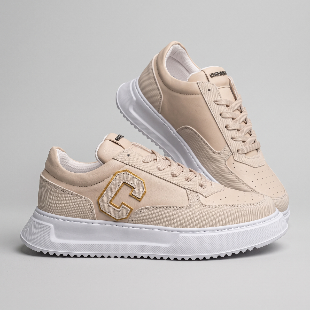 White CREST Sneakers by Chekich South Africa featuring clean design and white laces, displayed on a neutral background.