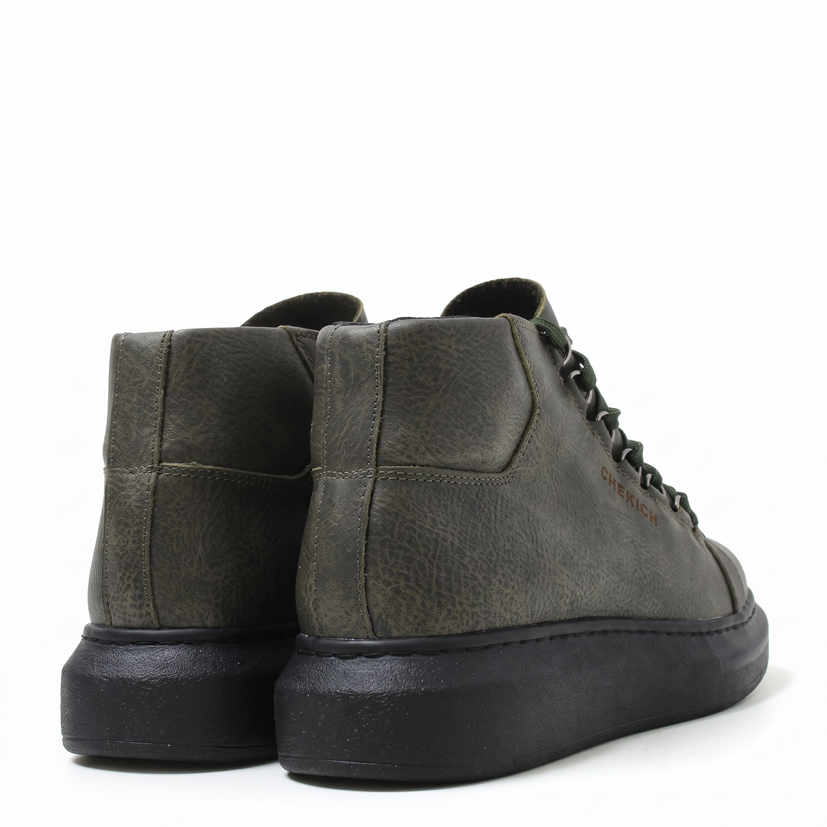 Chekich South Africa ROMA green and black boots with stylish design and ankle-high cut, showcased in the image.