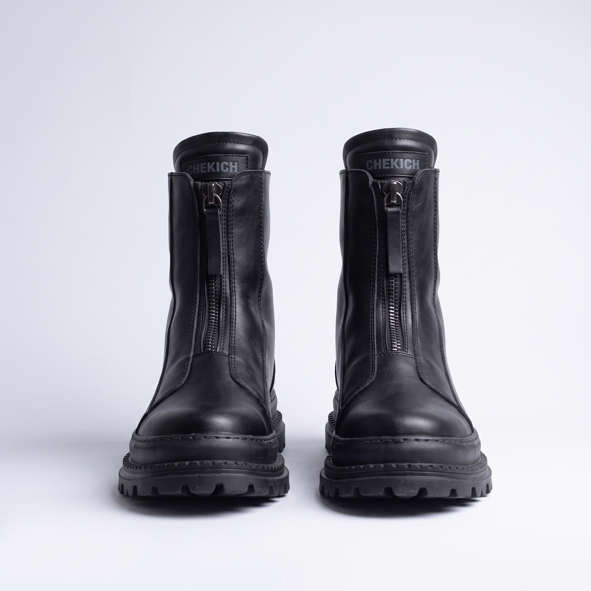Black CHEKICH South Africa FORCE sneakers with sleek design and lace-up closure, displayed on a white background.