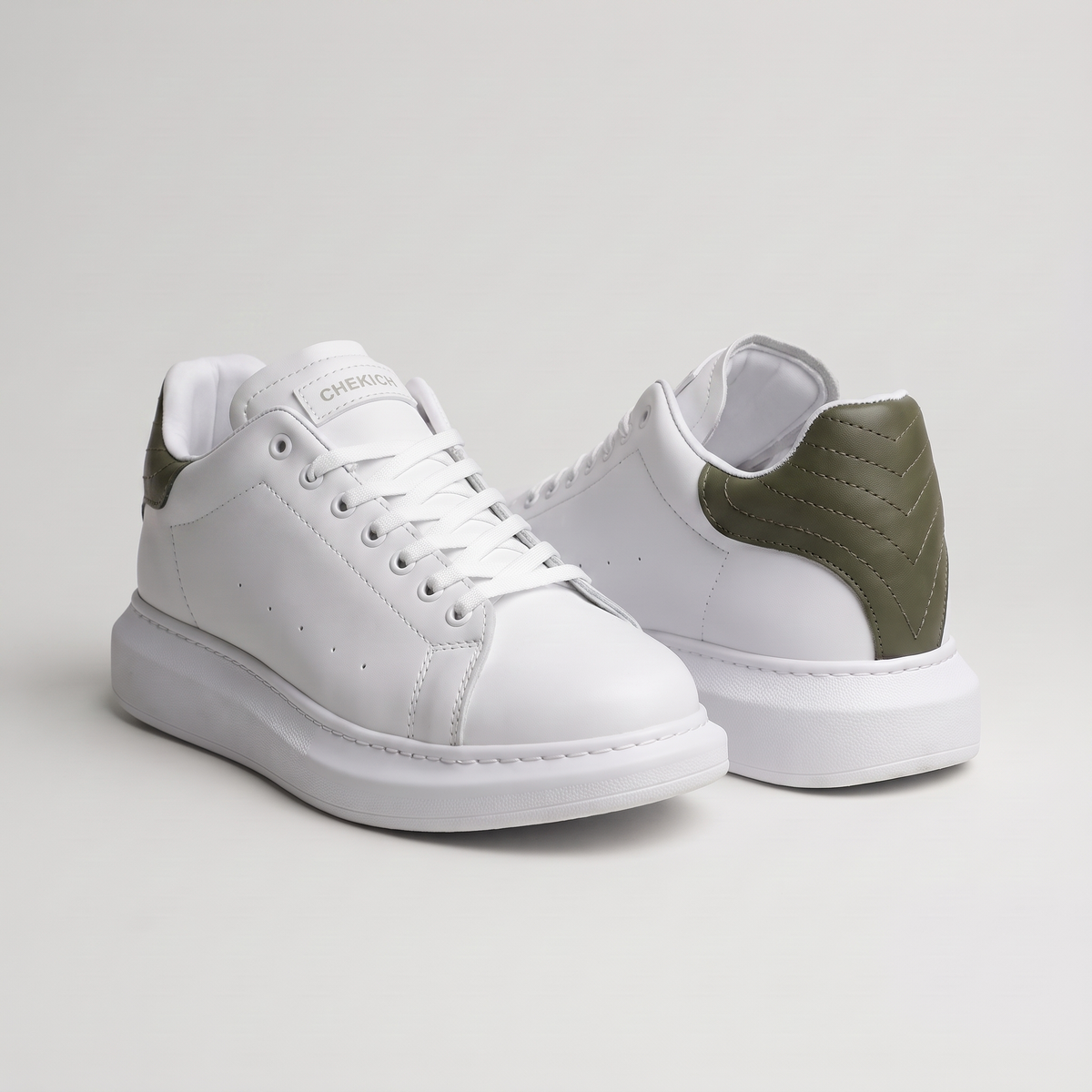 Chekich South Africa ORIGIN Green White product with green and white design on a sleek packaging.