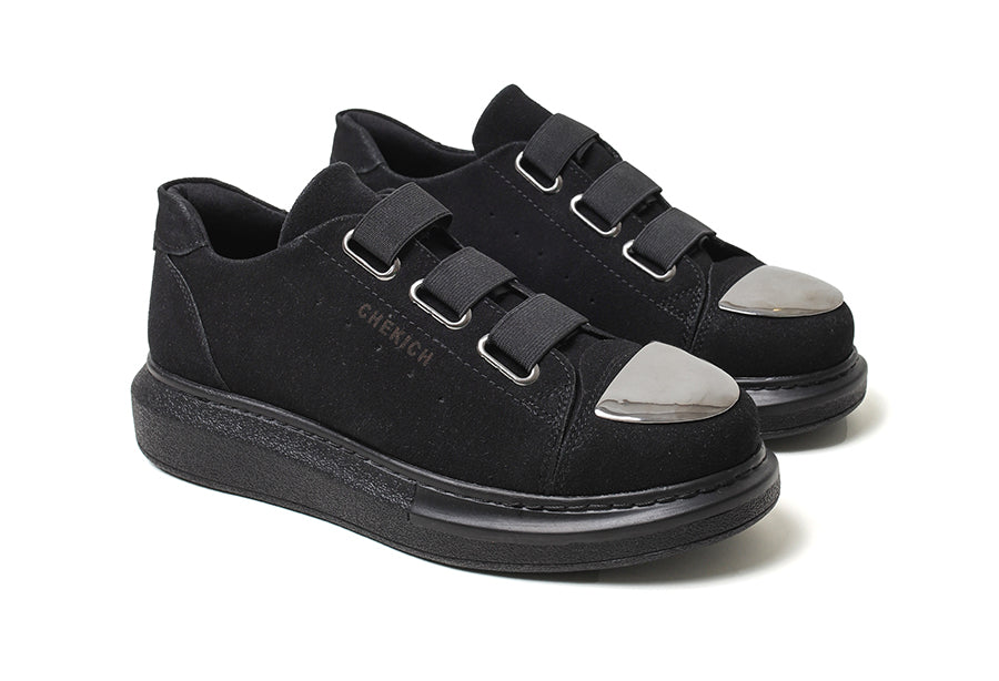 Black Mirror Suede Sneakers by Shopify featuring sleek design, mirror suede material, and all-black color scheme.