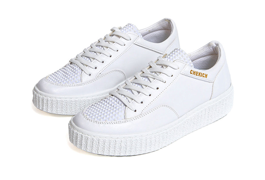 White Pyramid sneakers by Shopify featuring a sleek design and stylish laces, perfect for casual and sporty looks.